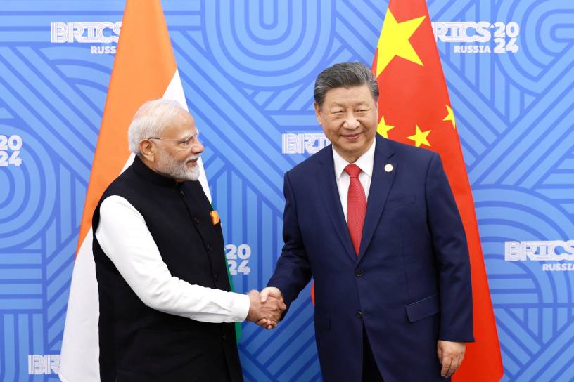 Chinese president Xi Jinping and India prime minister Narendra Modi meet on the sidelines of the Brics summit in Kazan, Russia, in October 2024. Image via China Daily/Reuters
