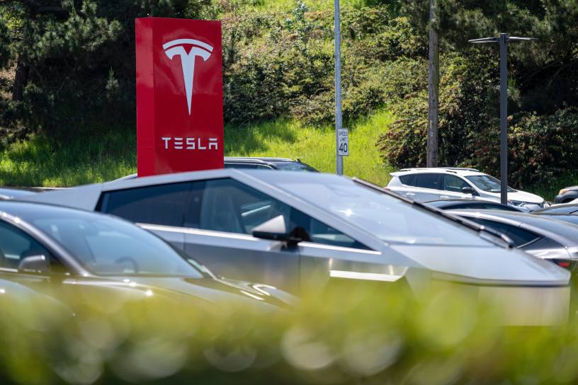 Tesla is a car maker with energy, robotics and AI all wound up into one package. Image: David Paul Morris/Bloomberg